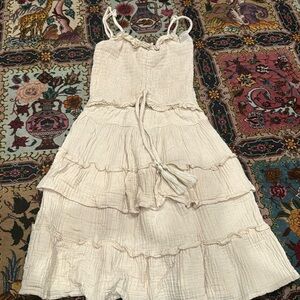 Ruffled cream dress